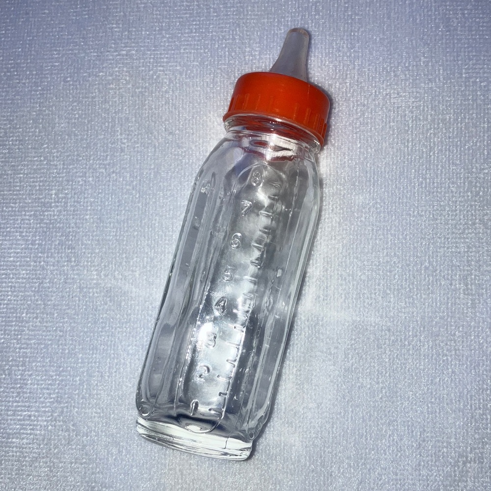 Vintage glass baby doll bottle